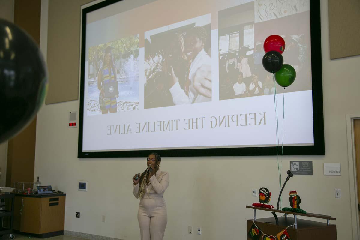 People enjoying the Black History Month closing ceremony